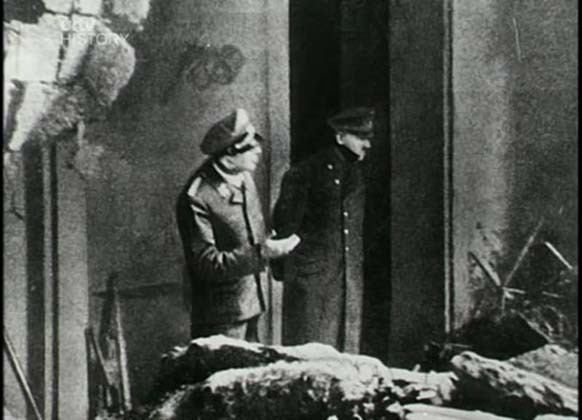 This photo of Adolf Hitler was taken approximately two days prior to his death. He was standing outside of his Berlin bunker, surveying the damage a bomb had done.