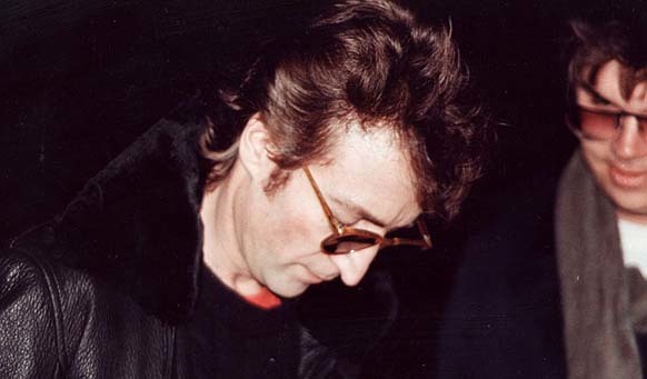 The man who shot John Lennon, Mark David Chapman, appeared in the last photo taken of the musician. He was asking for an autograph.