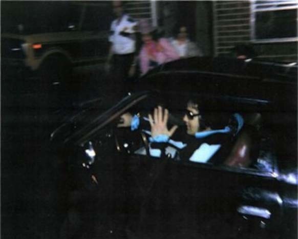 Elvis Presley pulls into Graceland with Ginger Alden on August 16, 1977, after visiting the dentist.