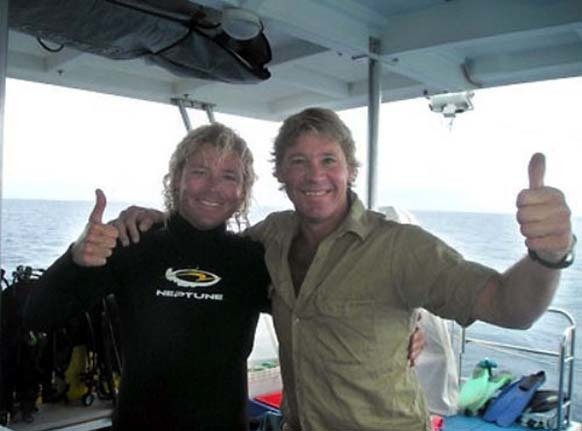 Steve Irwin poses with marine biologist Chris Jones on his boat two days before his death in 2006.
